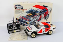 Tamiya - A boxed and constructed vintage Tamiya #58064 1:12 scale electric RC Toyota Celica Gr.