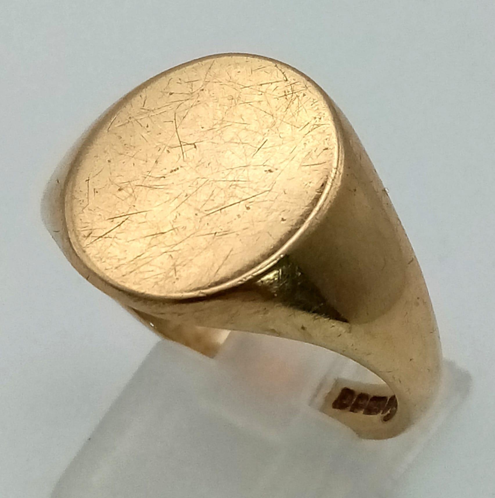 9k Yellow Gold Oval Signet Ring. Size W, weighs 8.7G