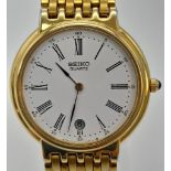 A Gilded Seiko Quartz Ladies Watch. Case -34mm. White dial with date window. In good condition and