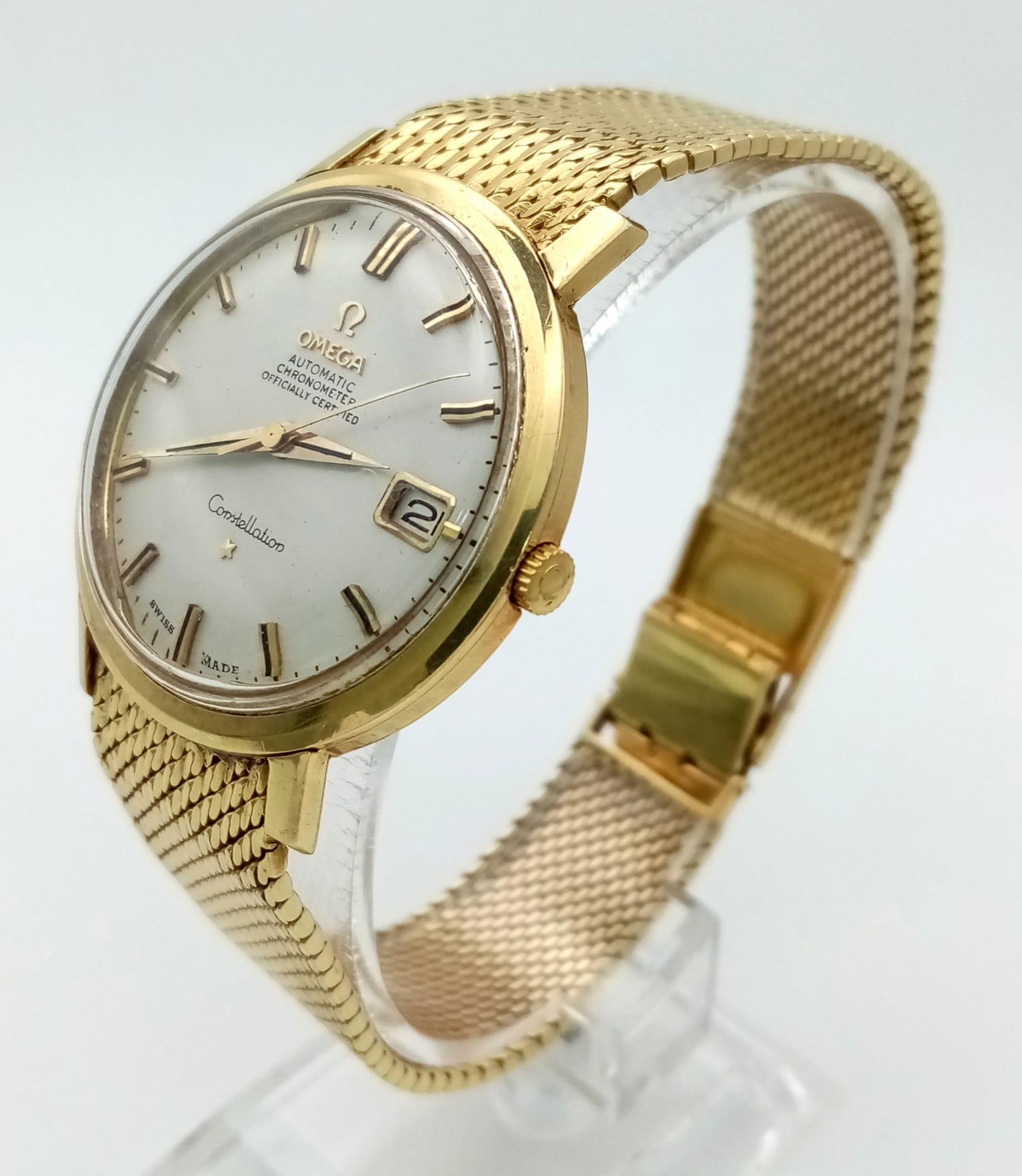 A 1960s 18K Solid Gold Omega Constellation Gents Watch. 18K gold strap and case - 36mm. White dial - Image 2 of 8