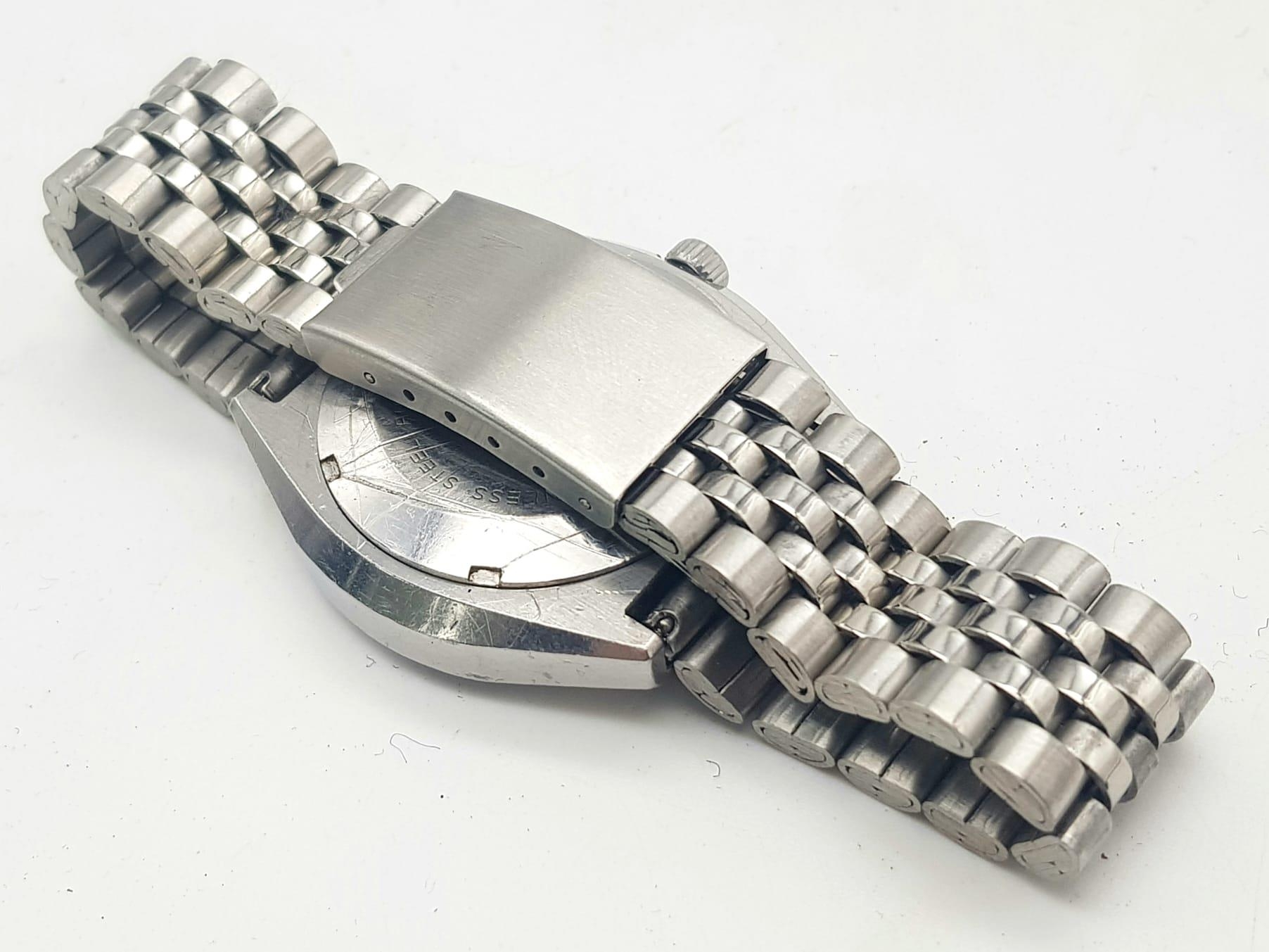 A Vintage Delma 25 Jewel Automatic Gents Watch. Stainless steel strap (new) and case - 38mm. - Image 7 of 9