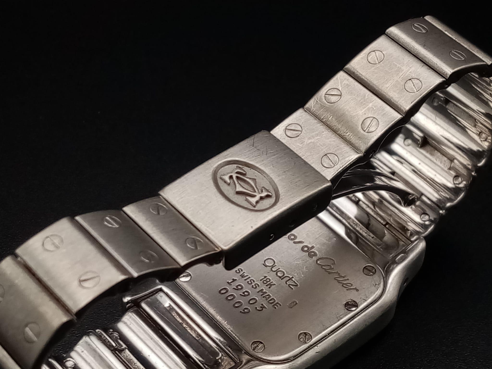 A Cartier Santos Moonphase Diamond Ladies Watch. 18K Gold strap and case - 24mm. White dial with - Image 7 of 10