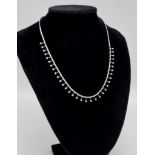 A beautiful diamond necklace which looks as a fancy and stunning as you could want. 4.00 carat