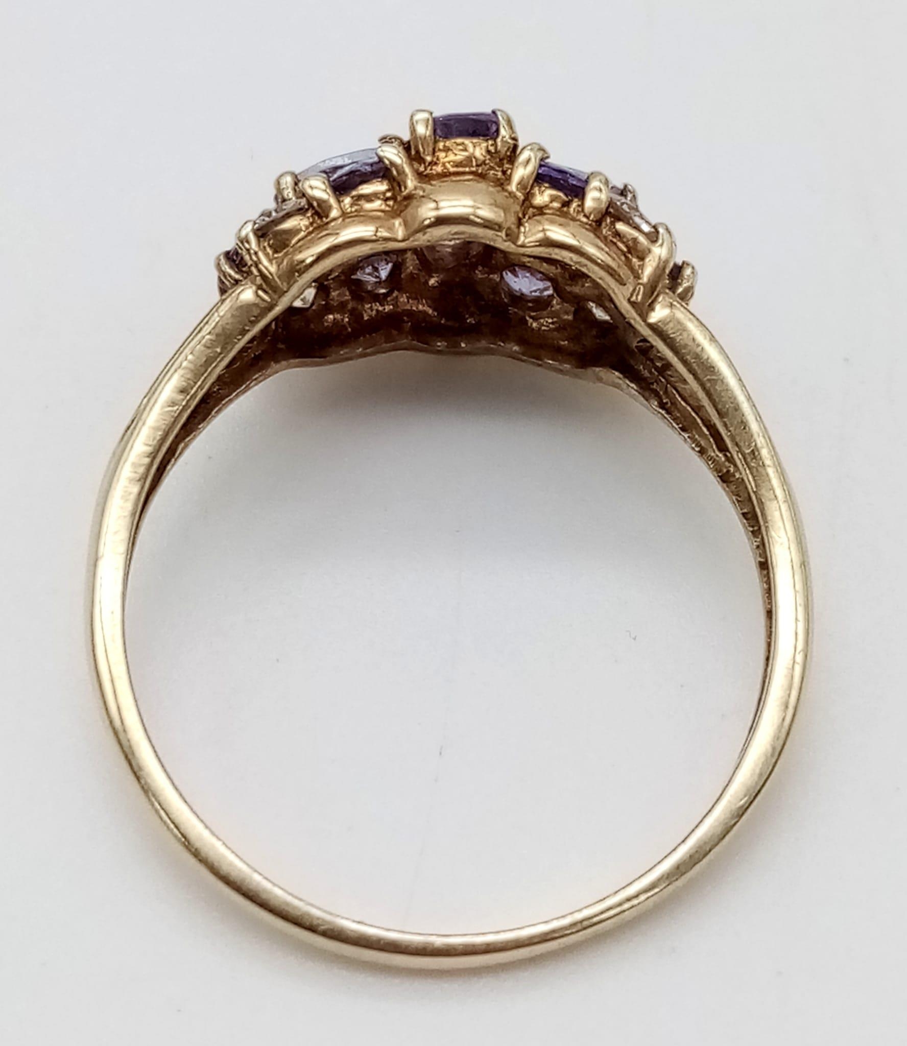 A 9K Yellow Gold Amethyst and White Stone Cluster Ring. Size P. 2.43g total weight. - Image 3 of 4