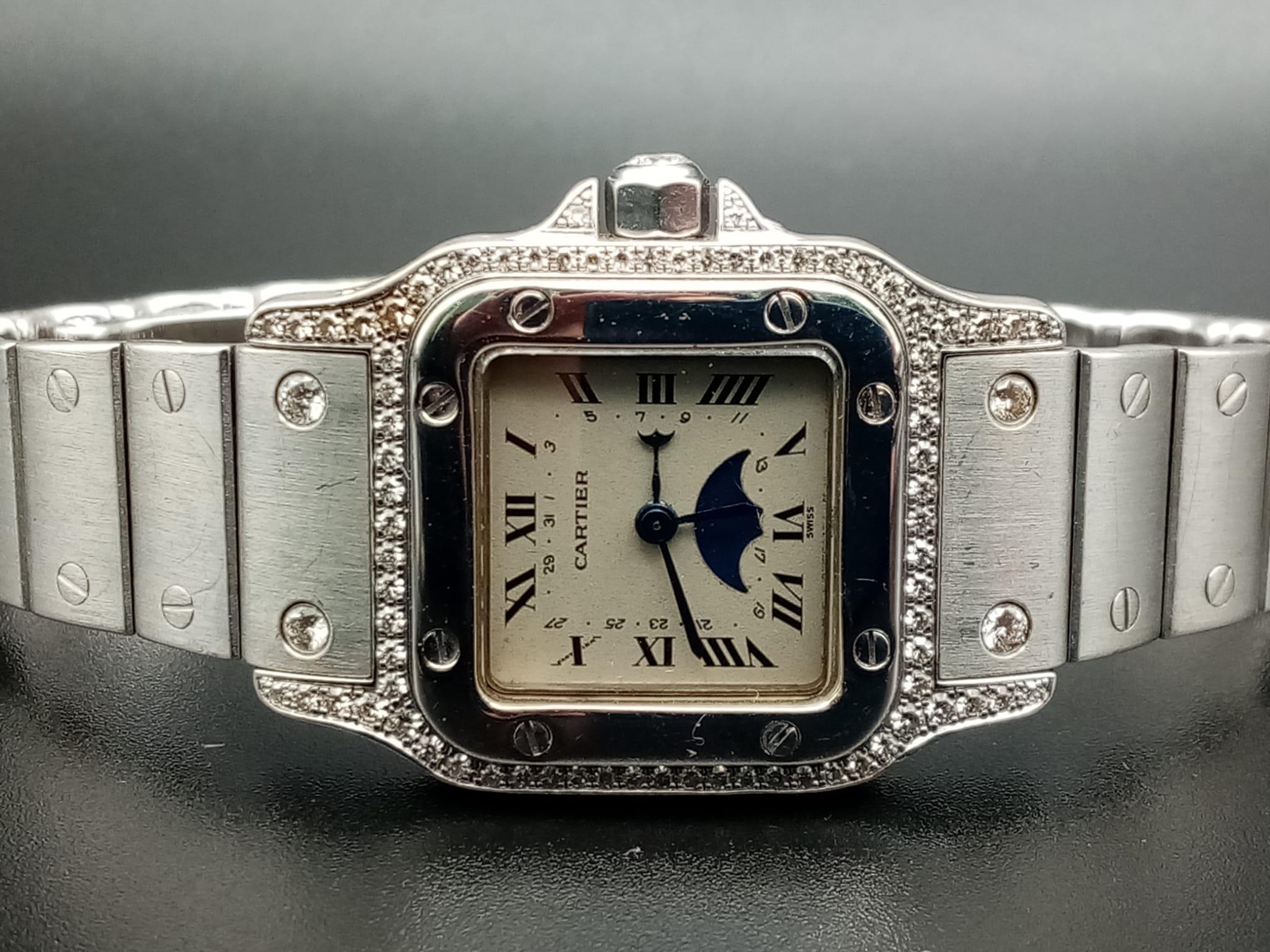 A Cartier Santos Moonphase Diamond Ladies Watch. 18K Gold strap and case - 24mm. White dial with - Image 4 of 10