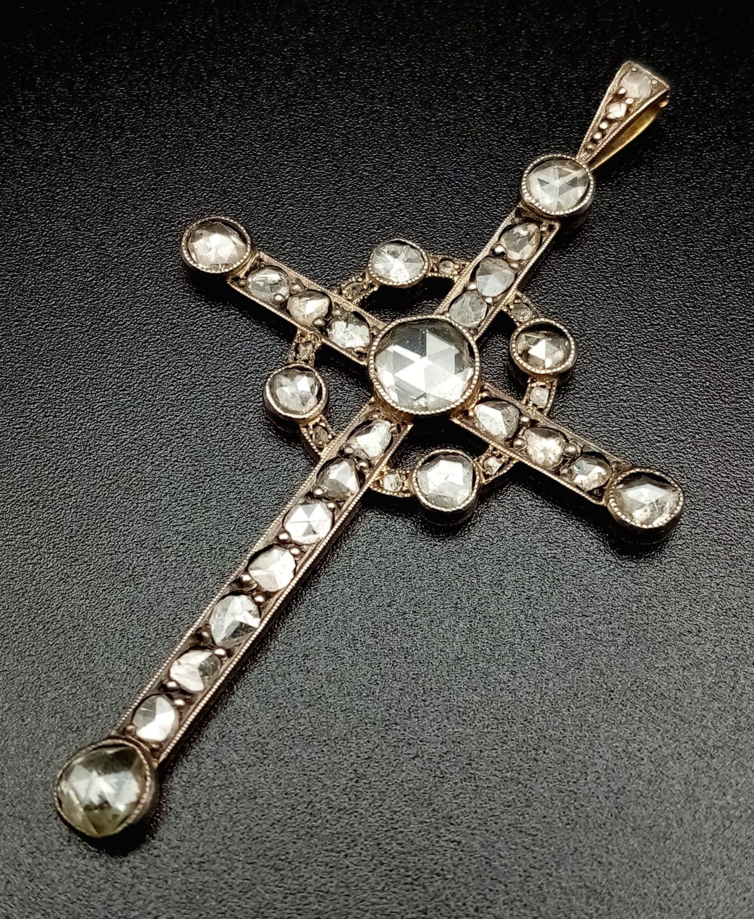 An Antique Art Deco 18K Gold and Diamond Cross Pendant. 2ct of old cut diamonds. 5.58g total weight.