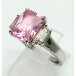 A VERY ATTRACTIVE SIVER RING WITH PALE PINK STONE. 4.4gms size Q