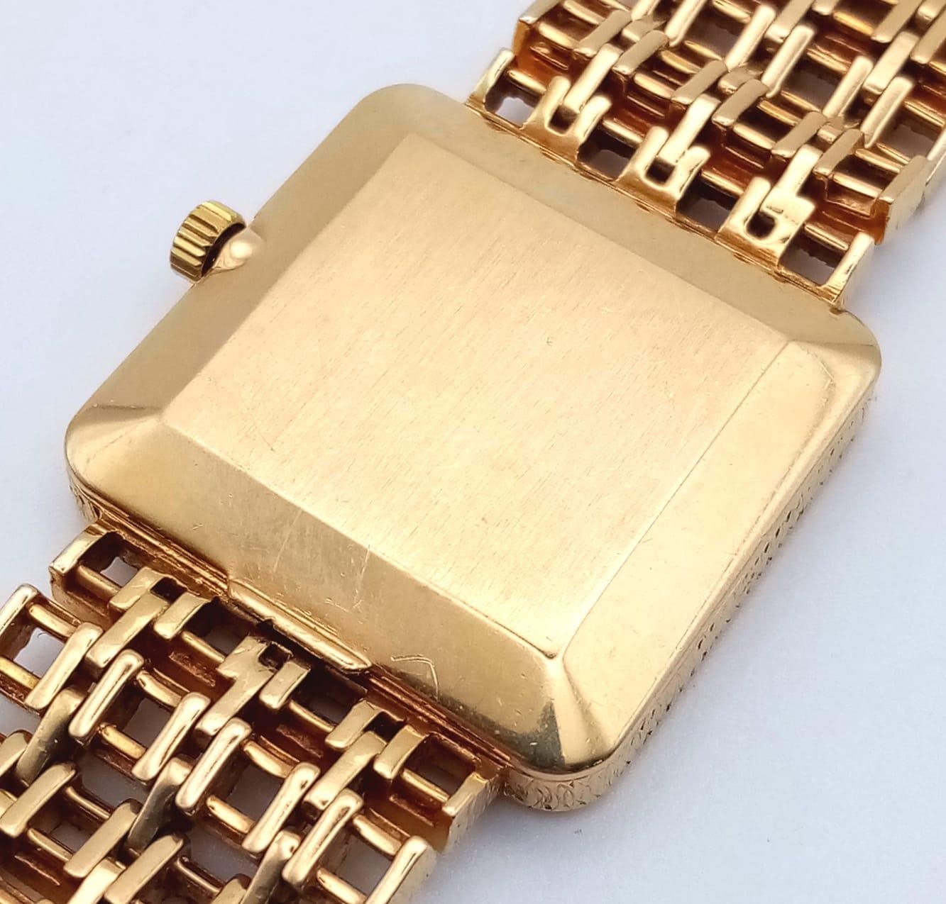 A Patek Phillipe Classic 18K Yellow Gold Ladies Watch. Woven gold bracelet. Gold case - 25mm. Two - Image 8 of 12