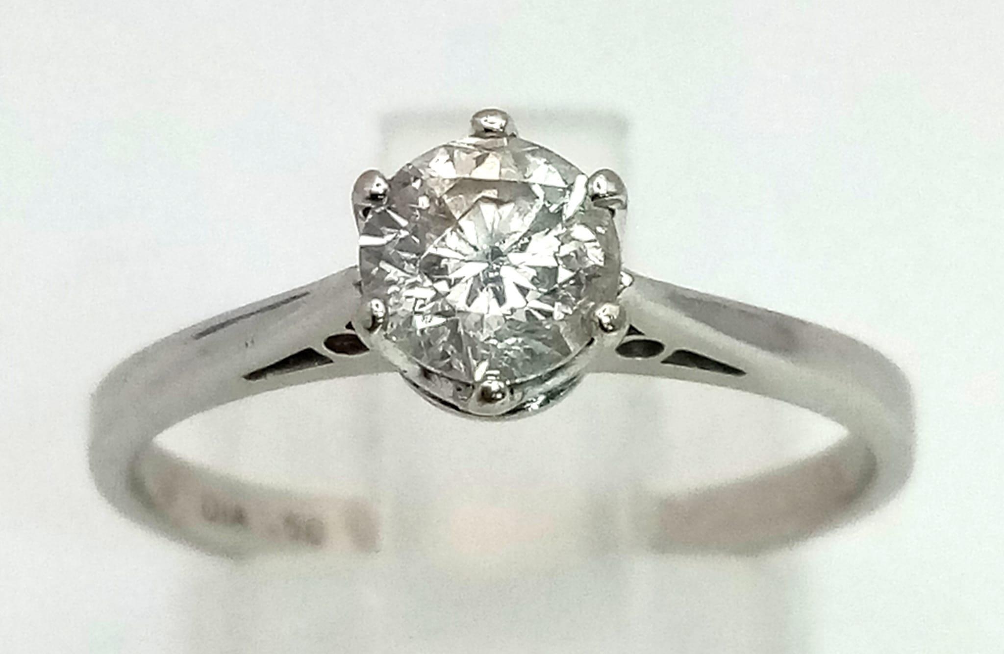 0.50 carat single stone diamond ring set in 18 carat white gold ring stamped