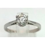 0.50 carat single stone diamond ring set in 18 carat white gold ring stamped