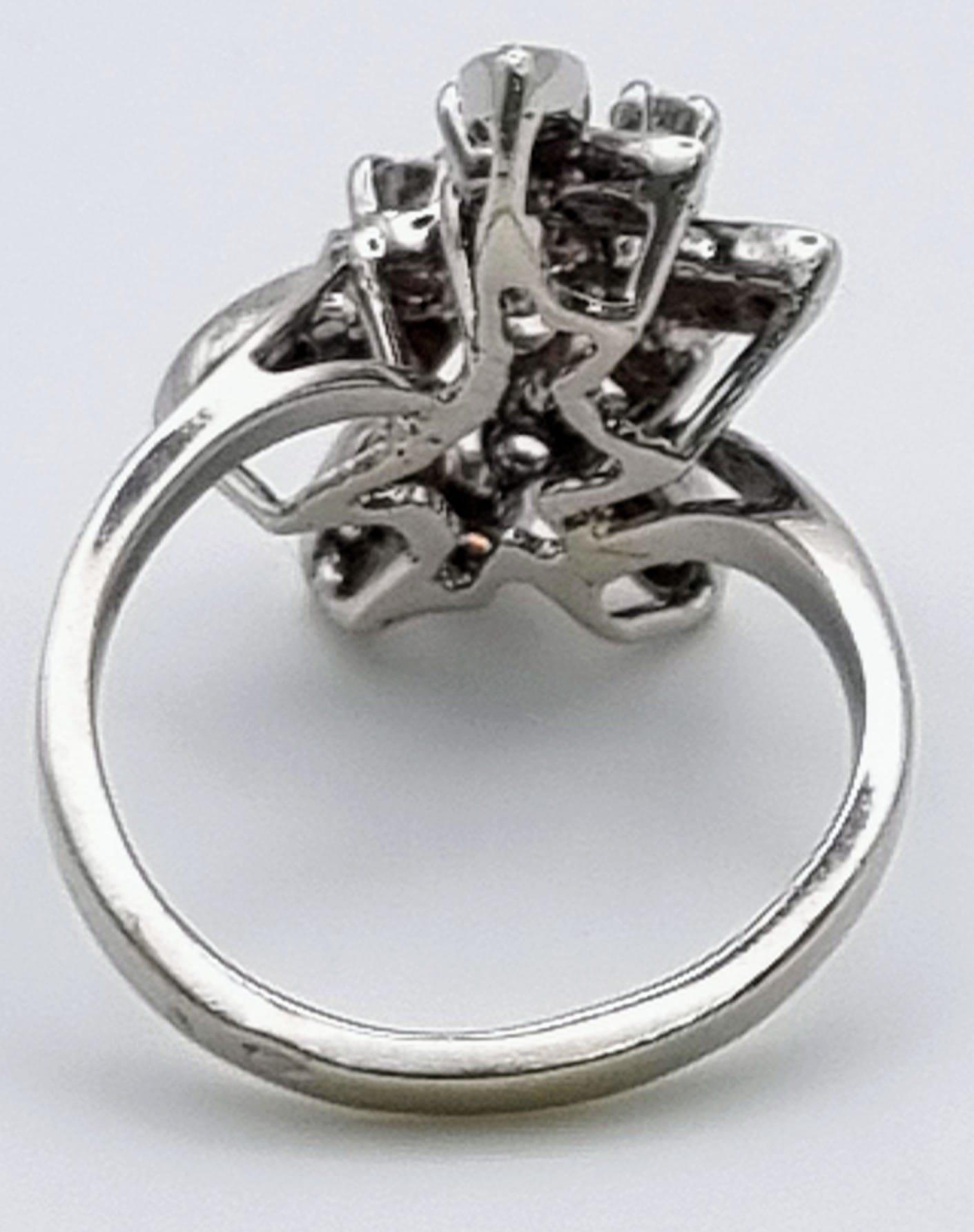 An 18K White Gold Diamond Floral Ring. Size K. 1ct 5.2g total weight. - Image 4 of 8