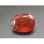 10.11cts of Natural Hessonite. Oval cut. IDT certified.