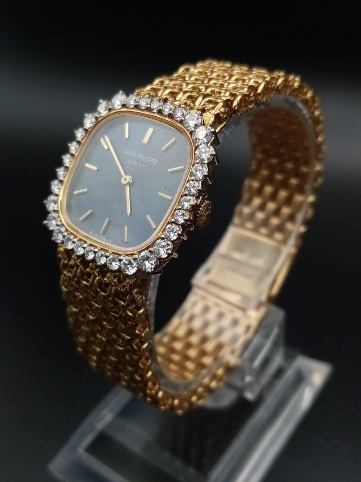 A Patek Phillipe Classic 18K Gold and Diamond Ladies Watch. Woven gold bracelet. Gold case - 24mm. - Image 2 of 11