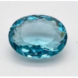 A wonderful, large (63.35 carats) AQUAMARINE. Oval cut, flawless, with excellent colour