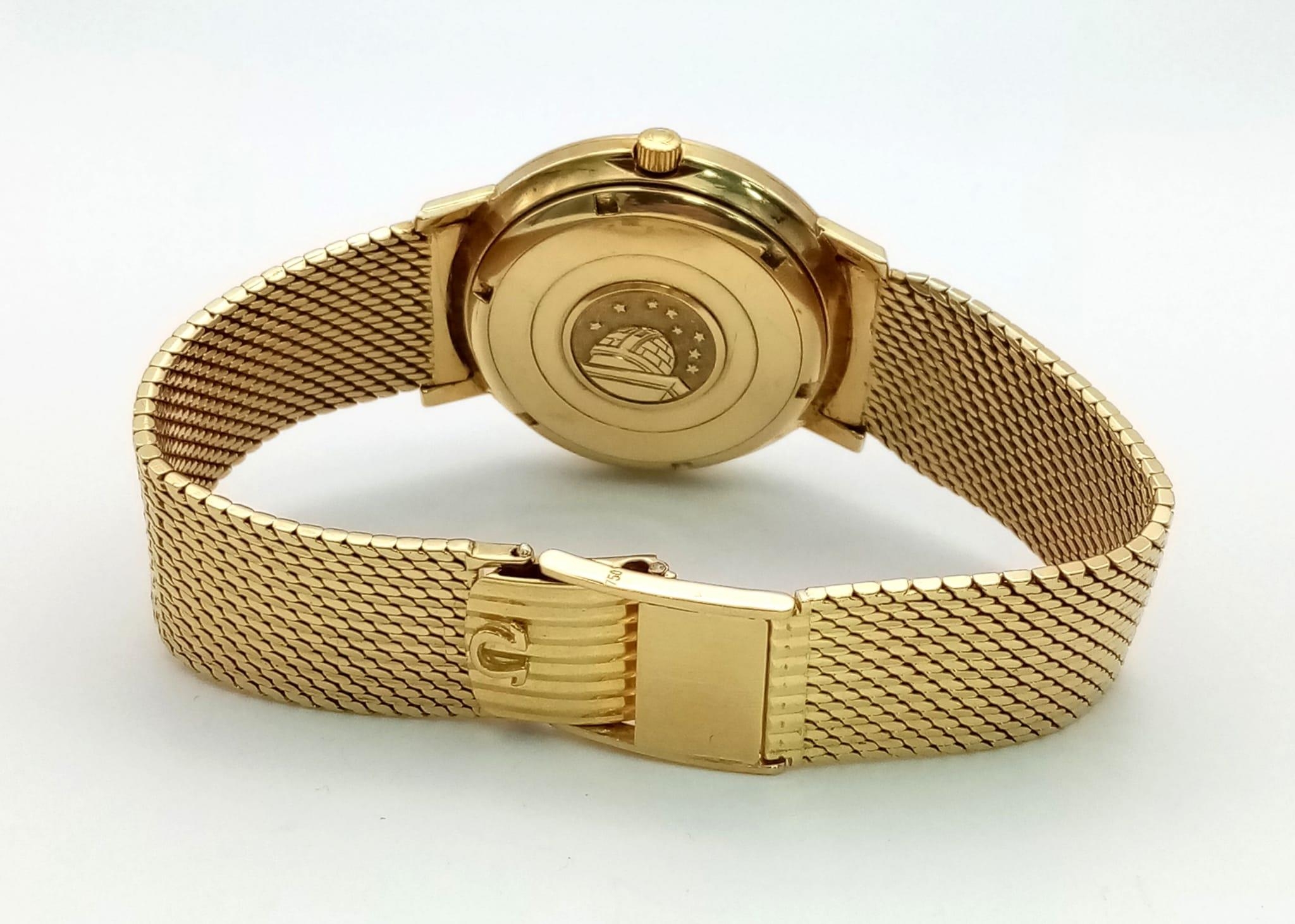 A 1960s 18K Solid Gold Omega Constellation Gents Watch. 18K gold strap and case - 36mm. White dial - Image 5 of 8