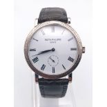 A Patek Phillipe Calatrava 18K White Gold Gents Watch. Leather strap. Gold case - 31mm. Mechanical