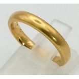 An 18K Yellow Gold Band Ring. Size M. 4.37g.