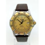 A Tag Heuer 2000 Professional Unisex Divers Watch. Brown leather strap. Two-tone stainless steel