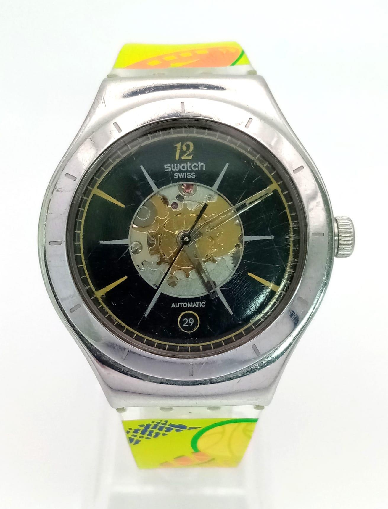 A Rare Swatch Dark Sky Automatic Unisex Watch. Colourful strap. Stainless steel case - 37mm. Black