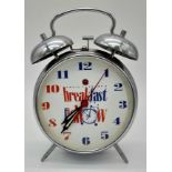A VINTAGE CAPITAL FM BREAKFAST SHOW DOUBLE BELL ALARM CLOCK. HEIGHT 17.5CM. IN WORKING ORDER.