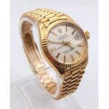 A Gold Rolex Oyster Perpetual Datejust Ladies Watch. Gold bracelet and case - 26mm. Automatic