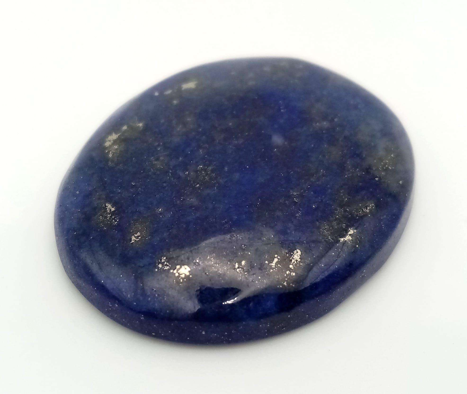 A 47.10ct Lapis Lazuli Oval Cabochon Gemstone. GLI Certified