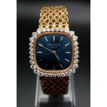 A Patek Phillipe Classic 18K Gold and Diamond Ladies Watch. Woven gold bracelet. Gold case - 24mm.