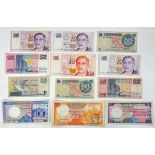 Twelve Vintage Singapore and Sri Lankan Currency Notes. please see photos for conditions.