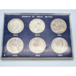 A UK Set of Six Crown Coins. 1935,37,51,53,60 and 1965. Please see photos for conditions.