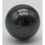 A Large Natural Black Tahitian Pearl. 18mm. 6.61g