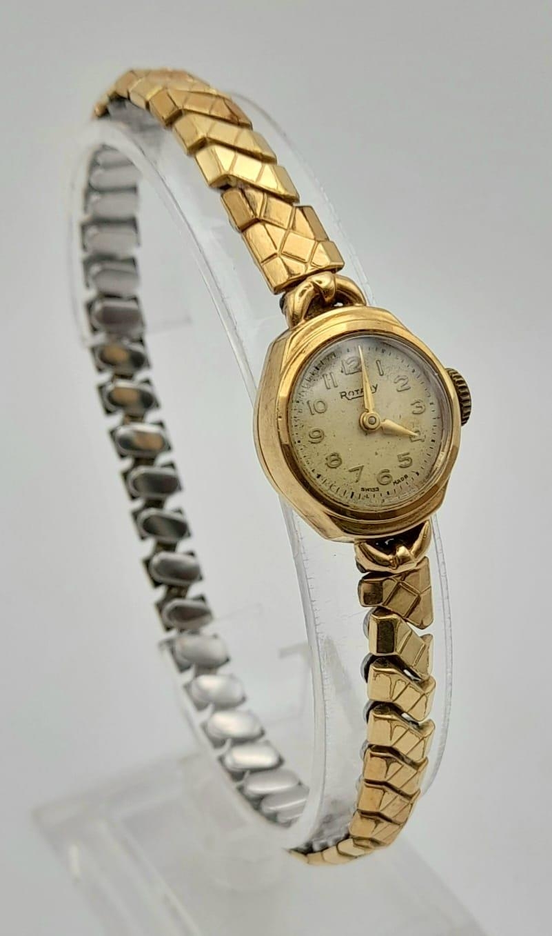 A Vintage Rotary 9K Yellow Gold Cased Ladies Watch. Expandable strap. Mechanical movement. A/F.