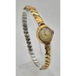 A Vintage Rotary 9K Yellow Gold Cased Ladies Watch. Expandable strap. Mechanical movement. A/F.