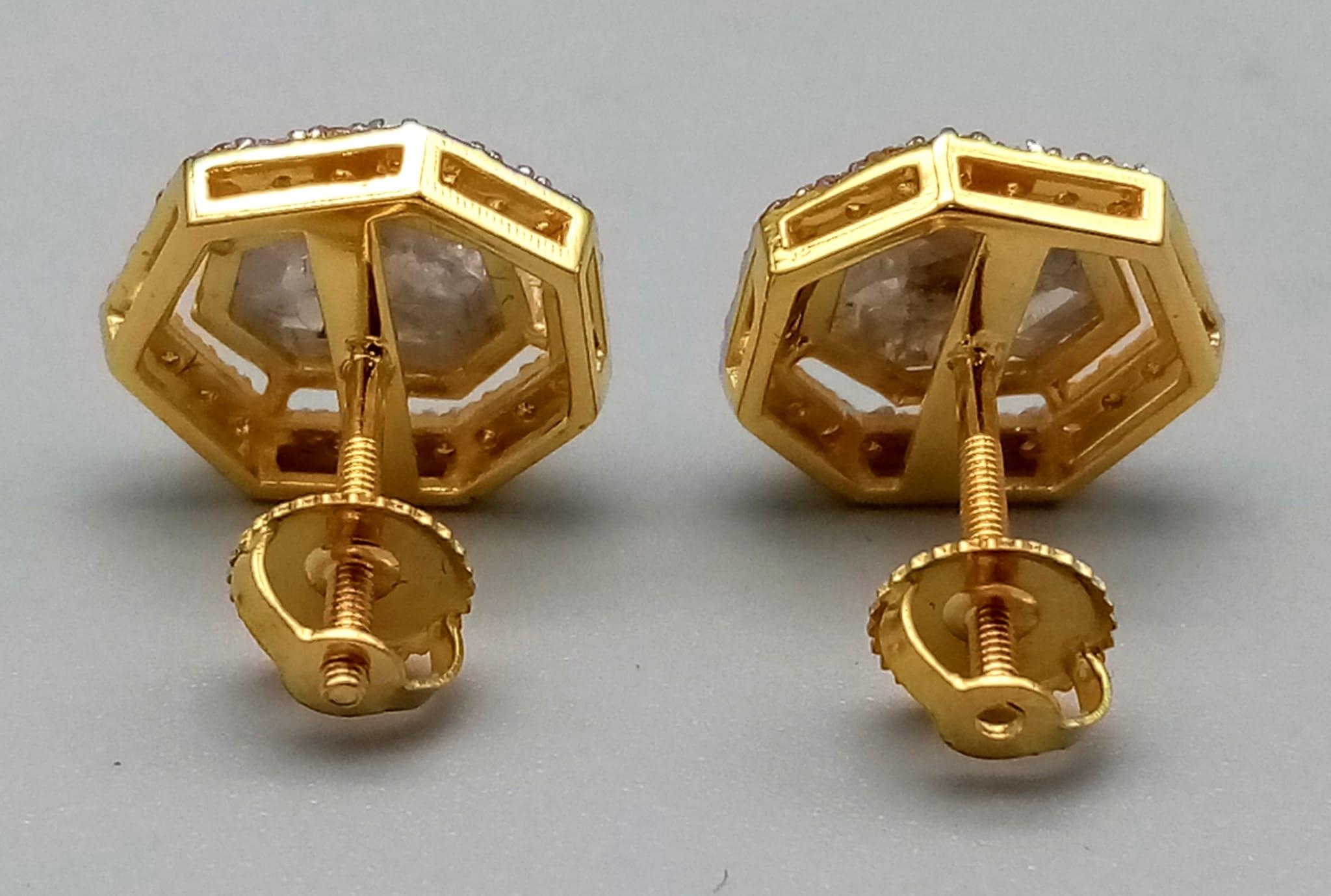 A 2.30ct Pair of Yellow Diamond Stud Earrings in 14k Gold -with .40ct Diamond Accents. 3.1g total - Image 3 of 5