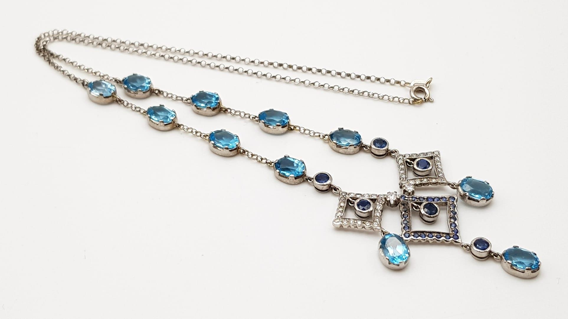 An Elegant 18K White Gold Necklace - interspersed with clean aquamarine stones and climaxing in a - Image 4 of 5