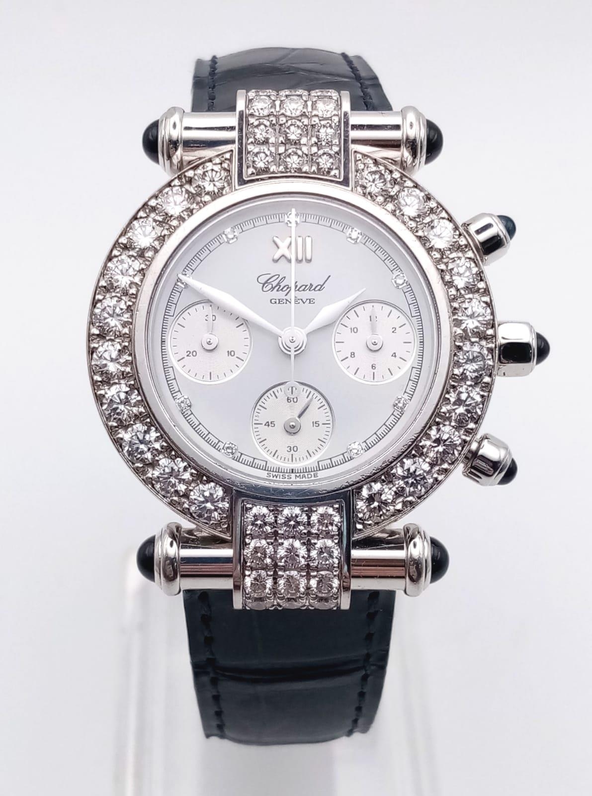 A Chopard Imperiale 18K Gold and Diamond Ladies Chronograph Watch. Blue leather strap. Gold and