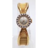A Vintage Patek Phillipe 18k Gold and Diamond Ladies watch. Gold bracelet and case - 16mm