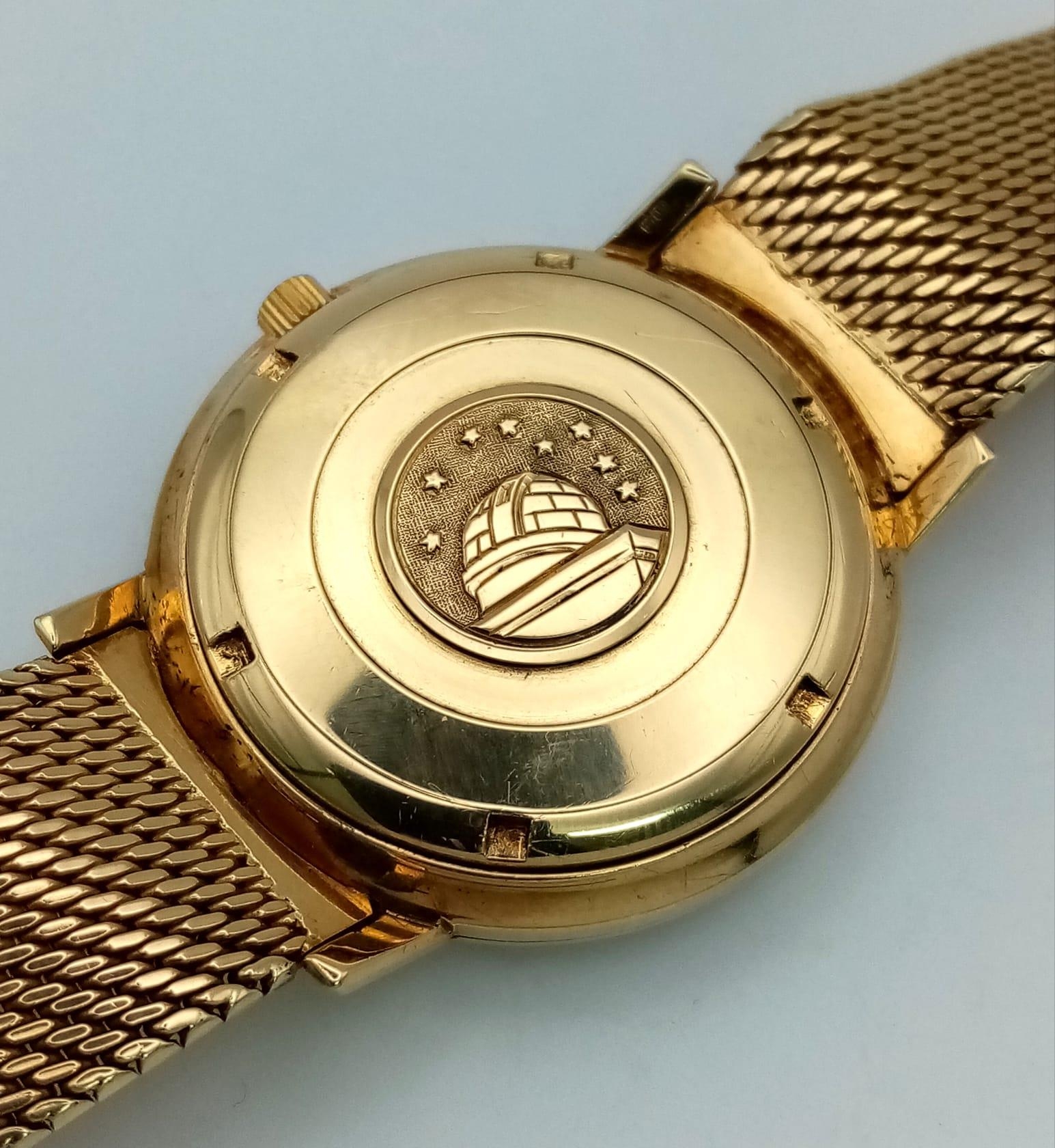 A 1960s 18K Solid Gold Omega Constellation Gents Watch. 18K gold strap and case - 36mm. White dial - Image 6 of 8