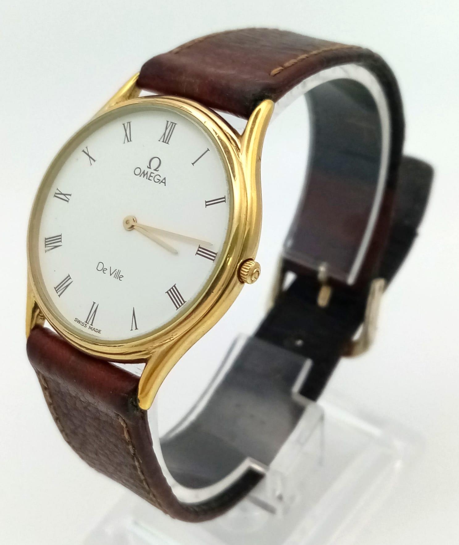 An Omega Deville Quartz Gents Mid-Size watch. Brown leather strap. Two tone case - 30mm. White dial. - Image 2 of 5