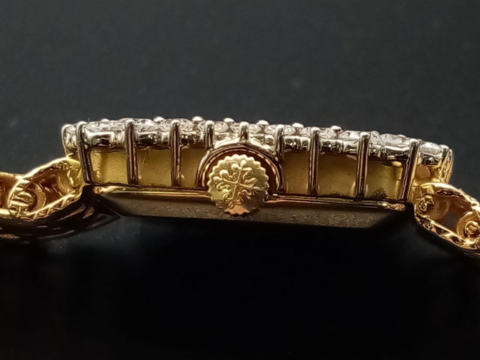 A Patek Phillipe Classic 18K Gold and Diamond Ladies Watch. Woven gold bracelet. Gold case - 24mm. - Image 11 of 11