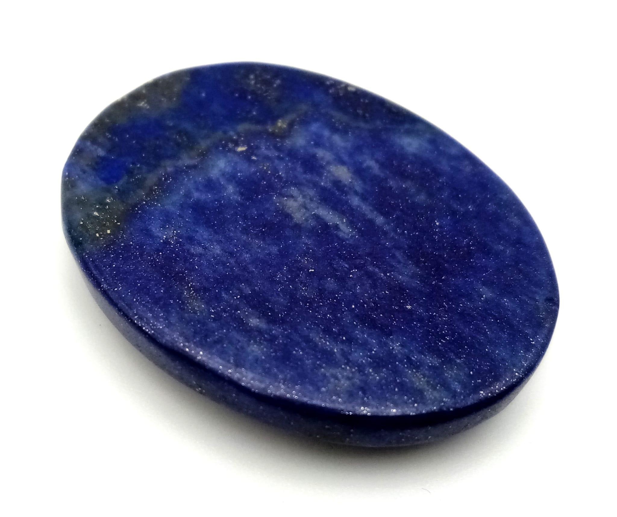 A 47.10ct Lapis Lazuli Oval Cabochon Gemstone. GLI Certified - Image 2 of 3