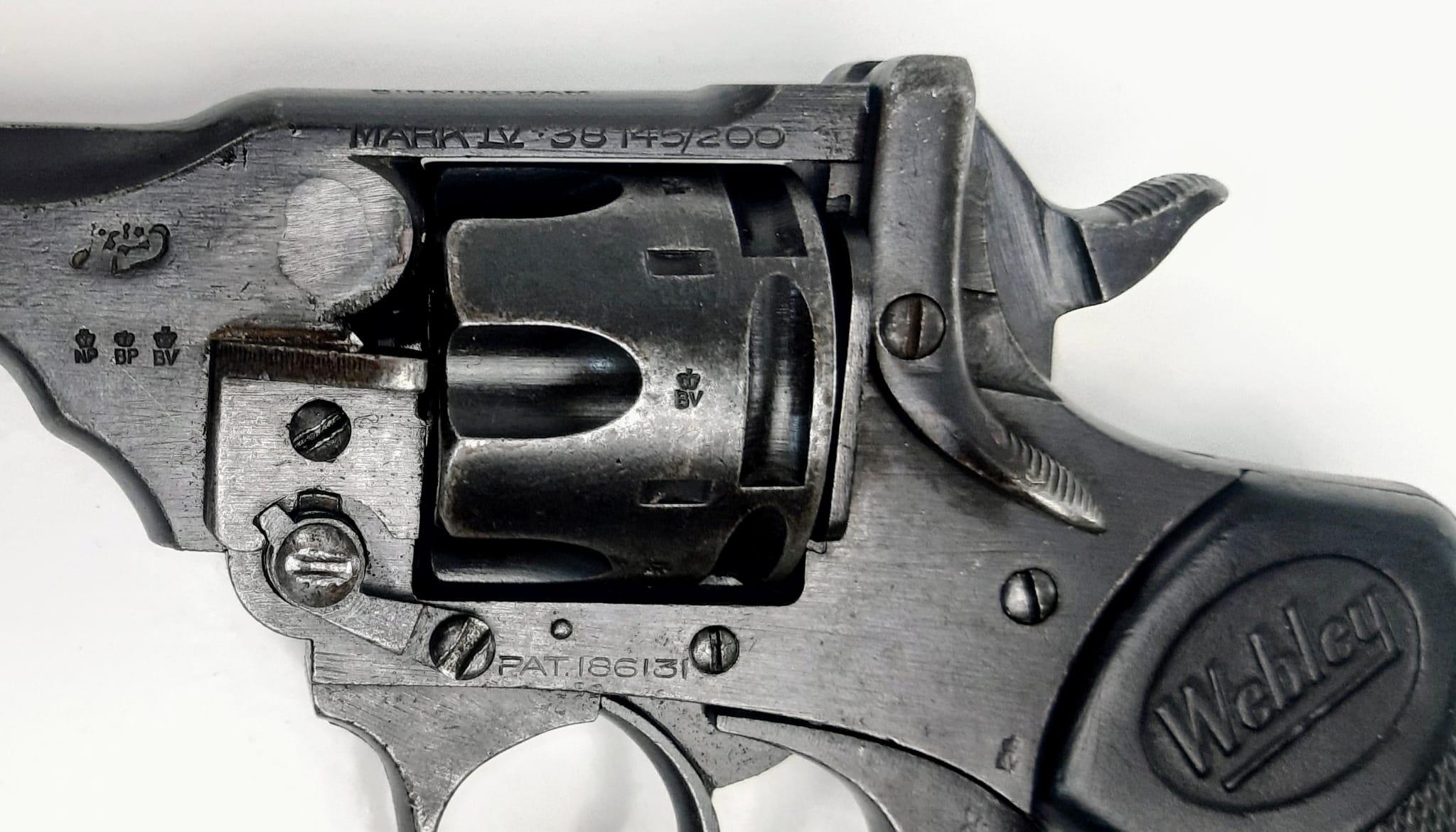 A Deactivated Webley Mark IV - 145/200 War Finish (government contract) Revolver Pistol. This WW2 - Image 3 of 10