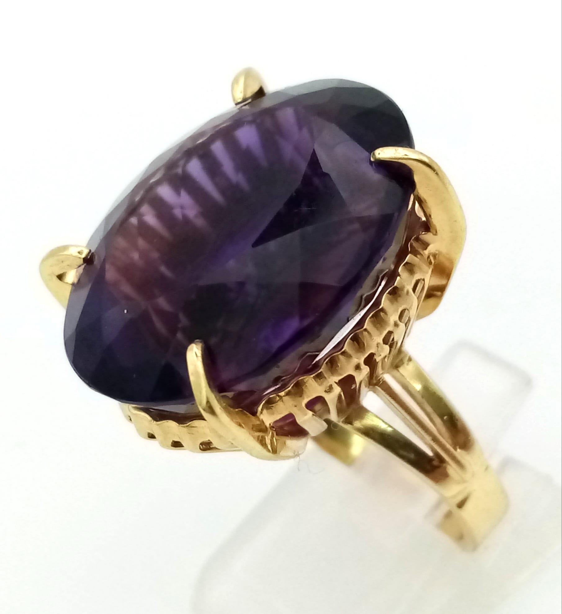 An 18k Yellow Gold and Siberian 35ct Plus, Amethyst Ring. 14.5g total weight. Size N.