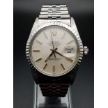 A Rolex Oyster Perpetual Datejust Gents watch. Stainless steel strap and case - 36mm. Cream dial.
