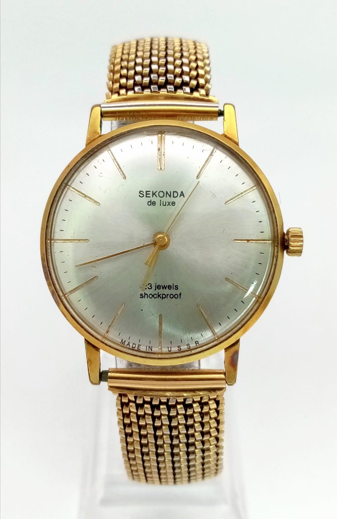 A Vintage Sekonda De Luxe - Made In the USSR Gents Watch. Gilded expandable strap. Two-tone case -