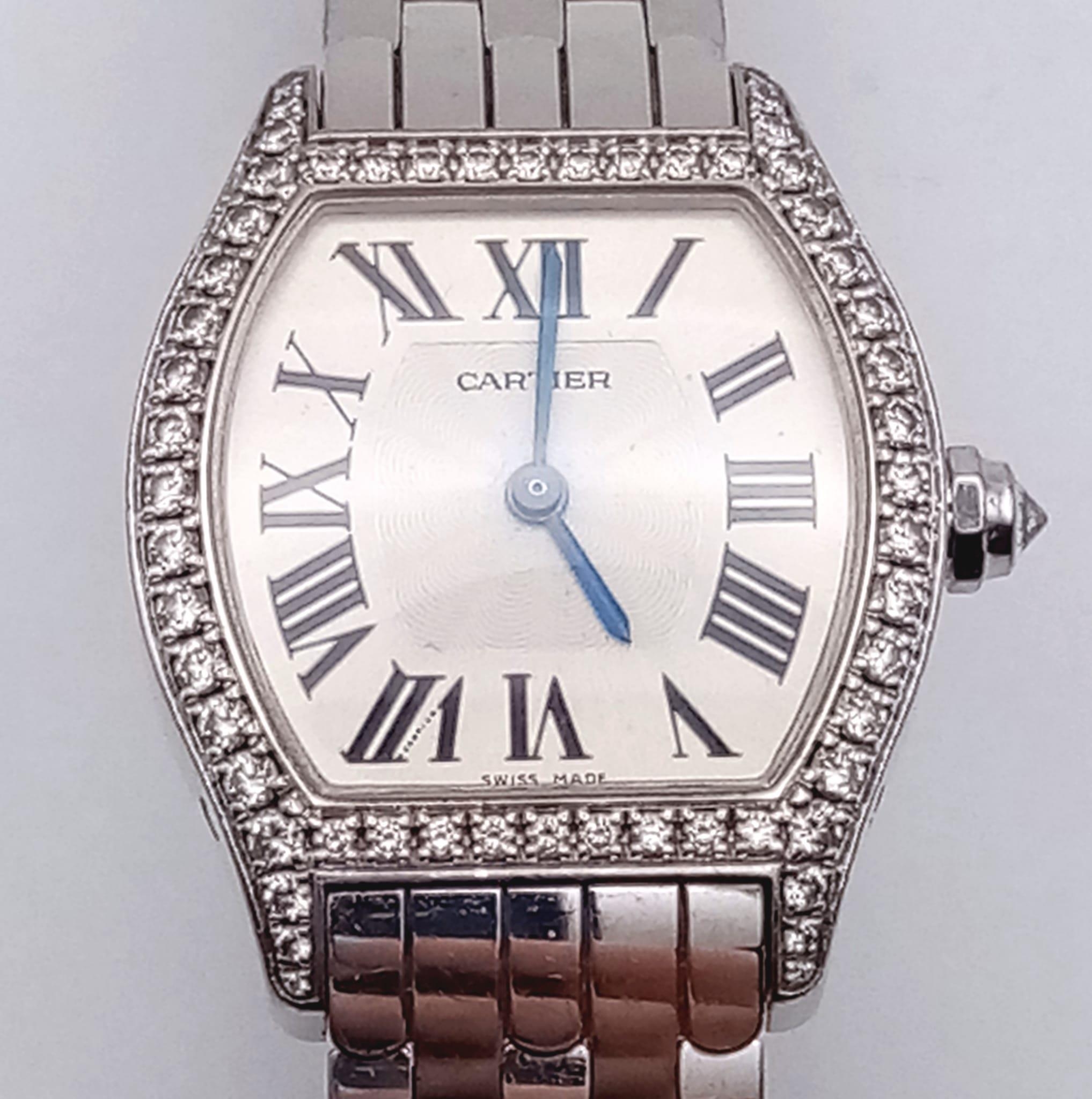A Cartier 18K Gold and Diamond Tortue Ladies Watch. 18K gold bracelet and case - 25mm. White dial. - Image 4 of 8