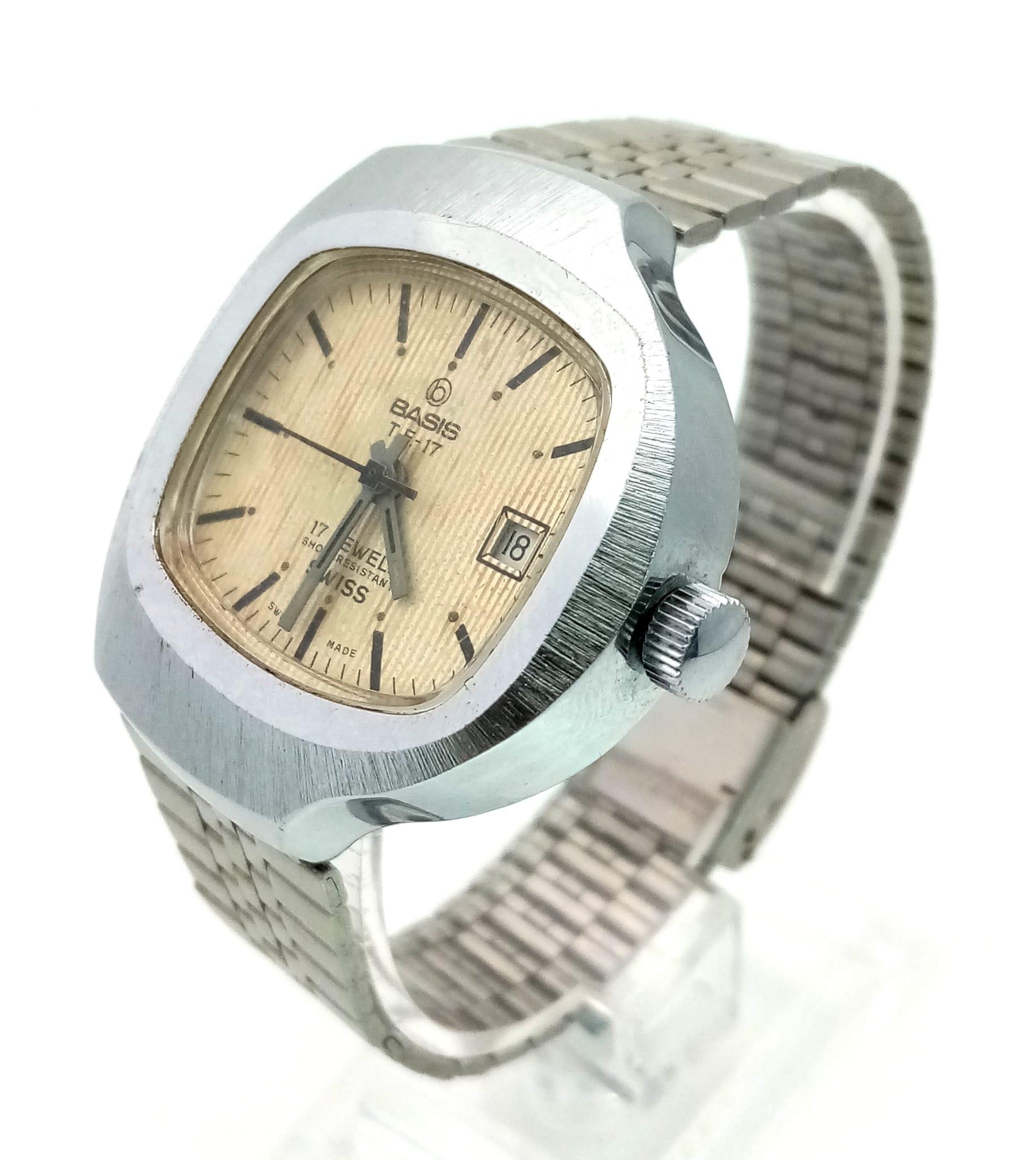 A Rare Vintage Basis T.F. 17 Mechanical Gents Watch. Stainless steel strap and case - 40mm. Gold