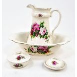 An Antique Victorian Wash Bowl, Jug and Two Lidded Soap Dish set with matching floral pattern.