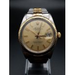 A Rolex Oyster Perpetual Datejust Gents Watch. Bi-metal strap and case - 36mm. Gold dial.