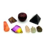 A Mixed Lot of Gems. A Huge Ruby drilled bead. (71gms, 1 x 1 inches). An Iolite Pyramid (44gms, 1.10