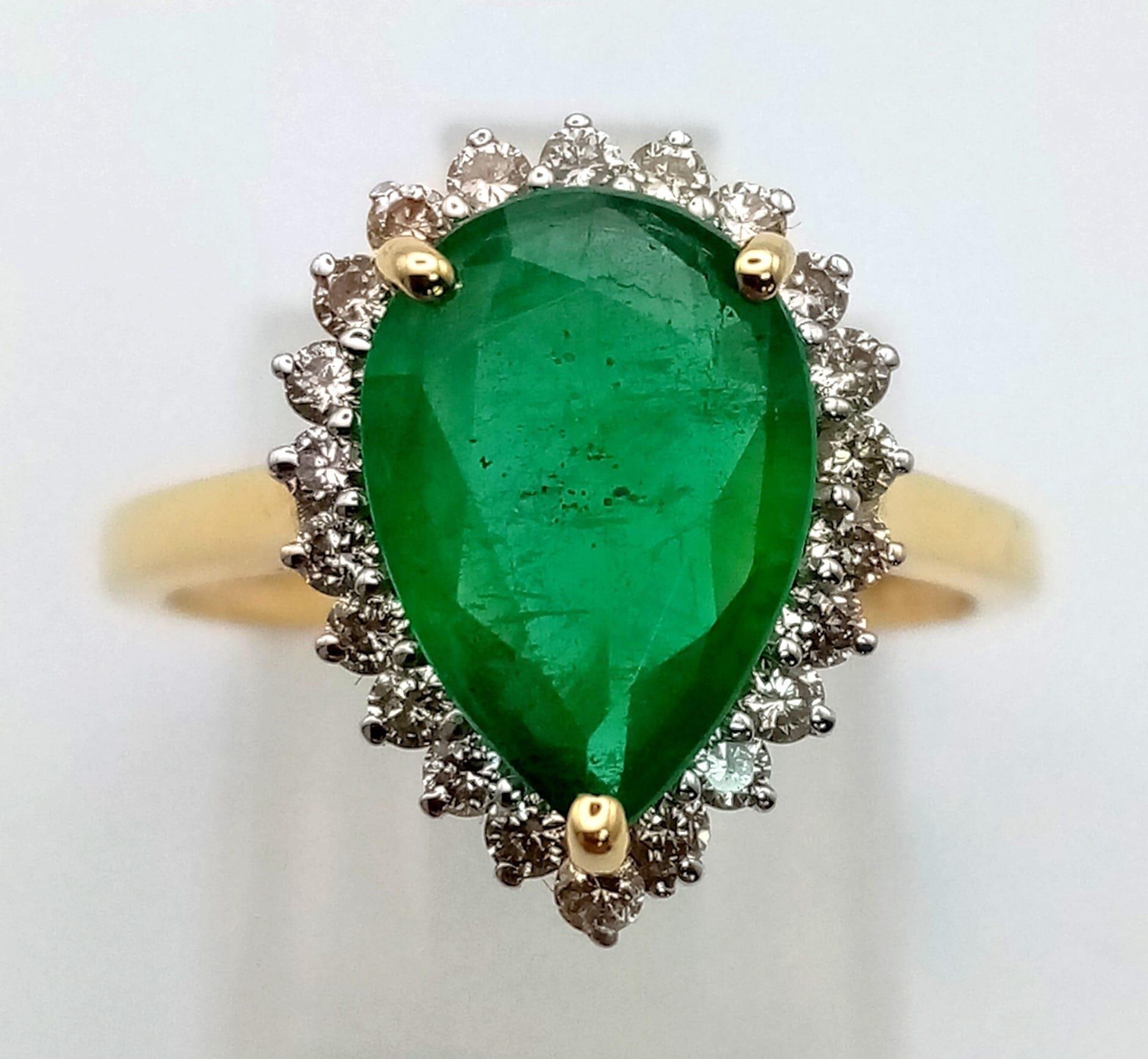 A 14K Yellow Gold 2.10ct Zambian Emerald with Diamond Surround (0.40ct) Ring. Size N/O. 2.9g total